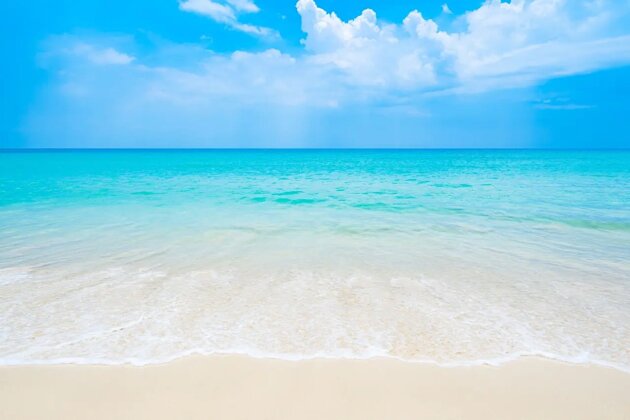 The clean and beautiful white beach of southern Thailand The clean and beautiful white beach of southern Thailand