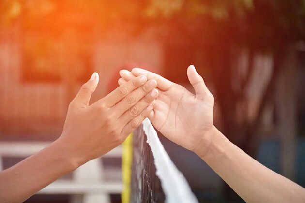 Athletes shake hands after the competition.