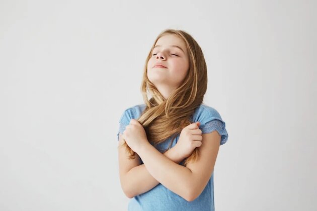 A portrait of pretty blonde girl taking deep breath of fresh air. A portrait of pretty blonde girl taking deep breath of fresh air.